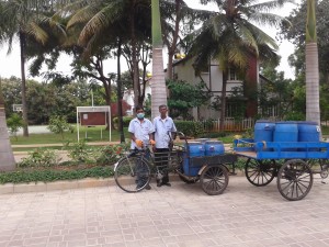 waste collectors with the tri-cycles used for collection